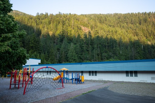 The old-growth at-risk can be seen on the slope just behind the school.