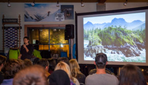 TJ Watt presenting a slideshow at Patagonia in Vancouver.
