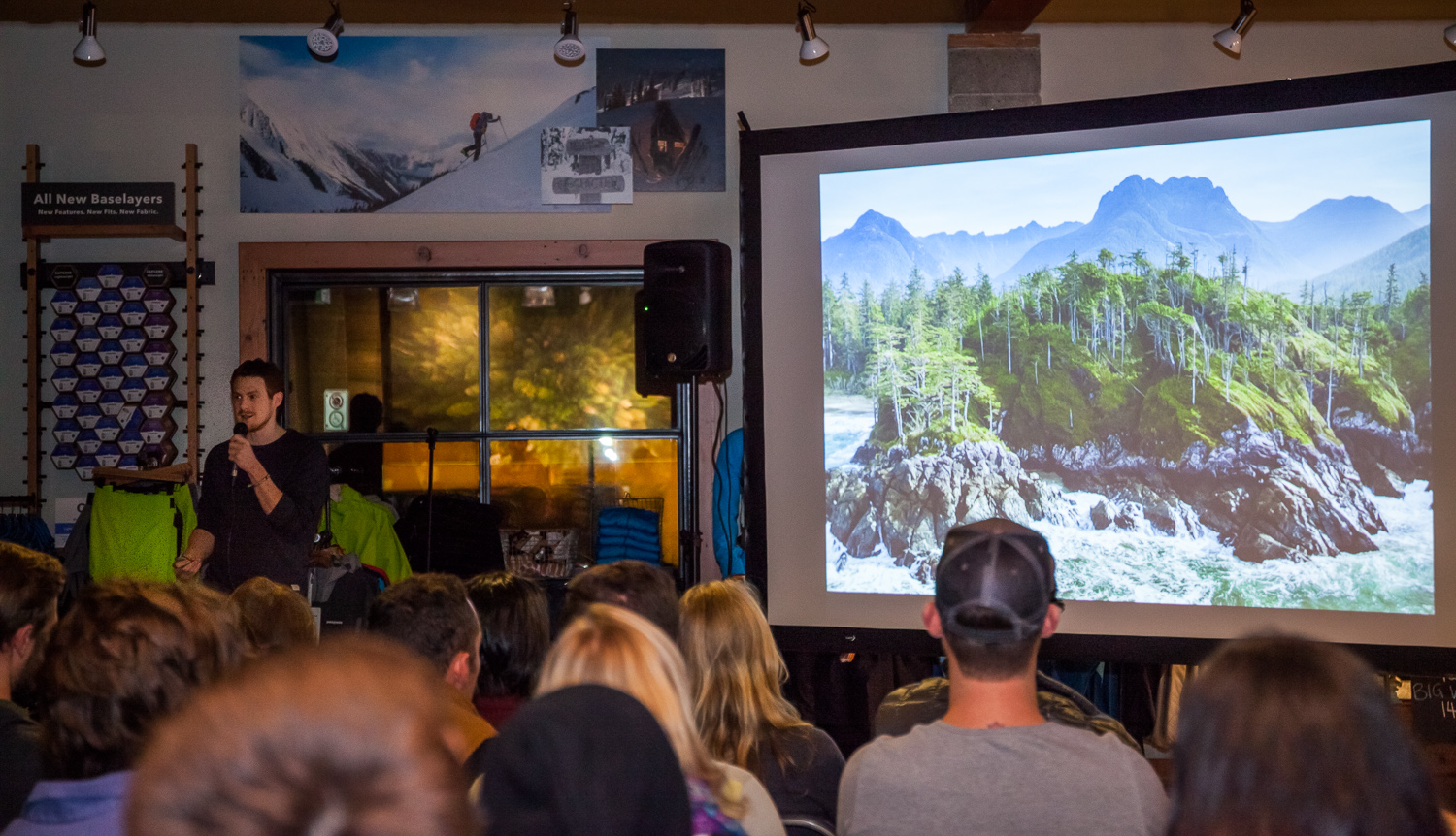 TJ Watt presenting a slideshow at Patagonia in Vancouver.