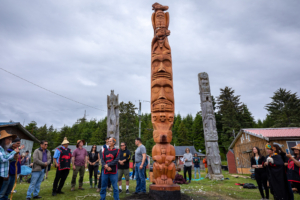 Totem pole raising in the village of Opitsaht on Meares Island.
