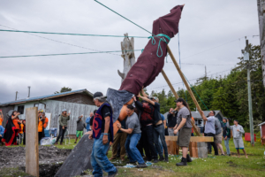 Totem pole raising in the village of Opitsaht on Meares Island.